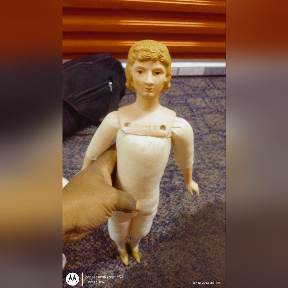 Romeo porcelain doll